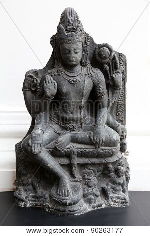 KOLKATA, INDIA - FEBRUARY 15: Six armed Avalokitesvara, from 10th century found in Basalt Nalanda, Bihar now exposed in the Indian Museum in Kolkata, on February 15, 2014