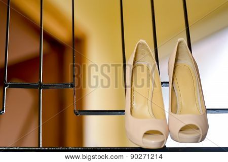 White Stilleto Bridal Shoes Hanging
