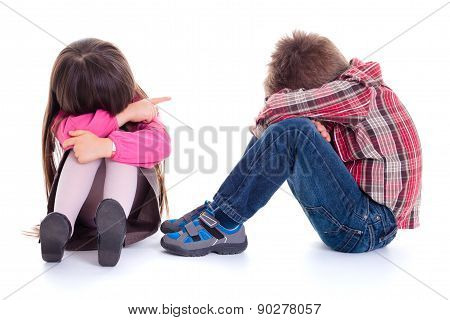 Angry Sulking Children Pointing At Each Other