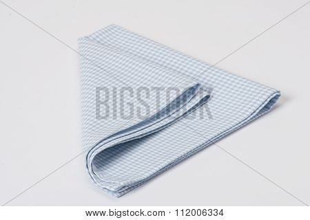 Folded Gingham Cotton Napkin On White Background