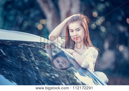 Asia Young Girl In Dress With Motor Car