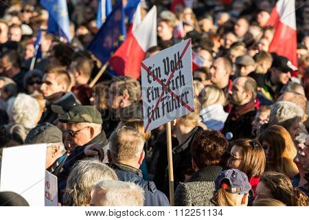 CRACOW POLAND - DECEMBER 19 2015: Cracow Main Square - The demonstration of the Committee of the Protection of Democracy / KOD/ against the break of law through the government PIS in Poland.