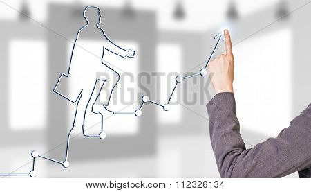 Businesswoman hand drawing a graph