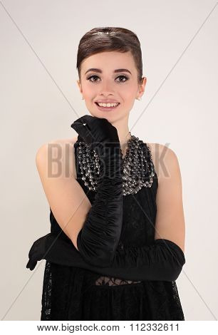 beautiful young woman in retro style . copy space.