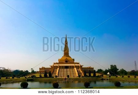 Gold Pagoda With Blue Sky Background
