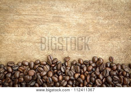Roasted Coffee Beans On Wooden