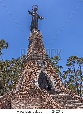 crucifixtion monument of Jesus in Sucre under blue sky