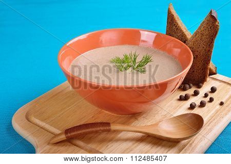 Mushroom Soup On A Turquoise Background
