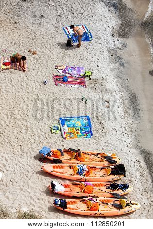 Top View Of Canoes At Tsigrado Beach In Milos Island, Cyclades, Greece