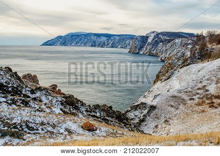 View above big beautiful lake and mountain in winter, Baikal lake, Russia, Siberia
