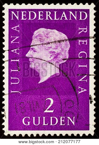 Moscow Russia - November 04 2017: A stamp printed in Netherlands shows portrait of Netherlandish Queen Juliana (1909-2004) circa 1973