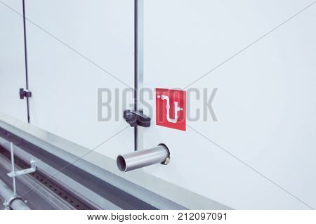 Industrial ventilation unit drainage pipe, closeup photo