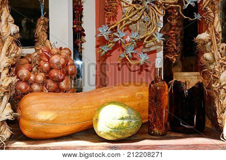 Squashes with onions and infused oils displayed outside a restaurant Rethymno Crete Greece Europe.