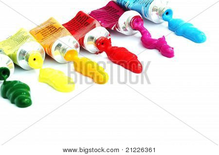 Bright & colorful artist paint squeezed & messy