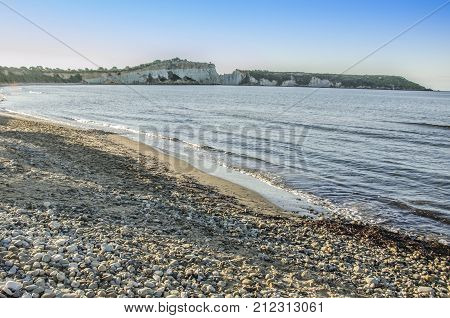On the beach of Gerakas on the island of Zakynthos tourists alternate the sun and the baths with sandy rocks turtles and cliffs