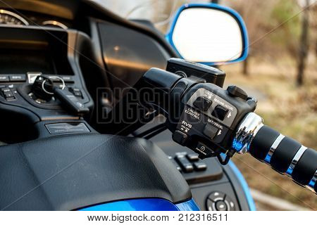 KHABAROVSK, RUSSIA - May 3, 2017: Honda Trake three-wheeled motorbike hand-assembled stands on flat ground in the street on Khabarovsk on may 3, 2017
