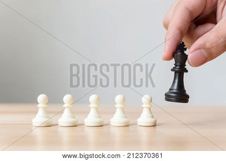 Different pawn chess board game Leadership business Unique Think different Individual and standing out from the crowd concept