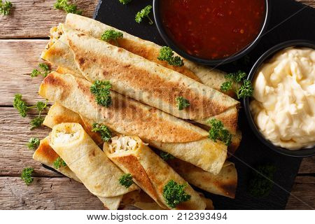 Homemade Spicy Chicken With Chicken And Two Sauces Close-up. Horizontal Top View