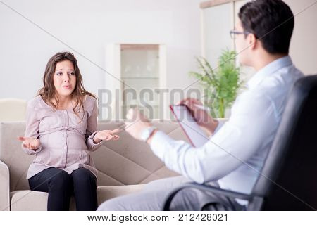 Pregnant woman visiting psychologist doctor