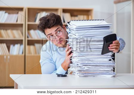 Funny accountant book-keeper working in the office