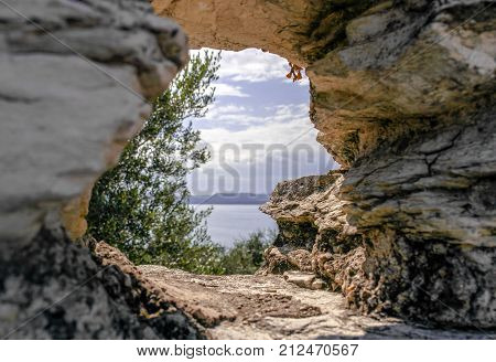 natural and beautiful rocky window to mountains and lake
