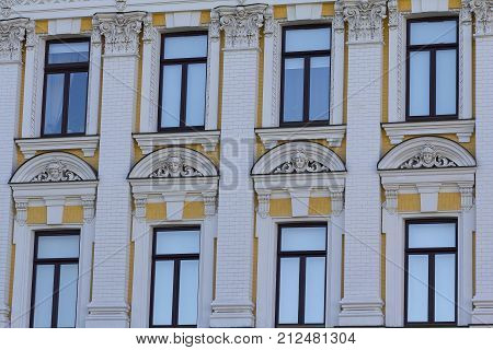 Windows of the facade of the building in the classical style. Architecture