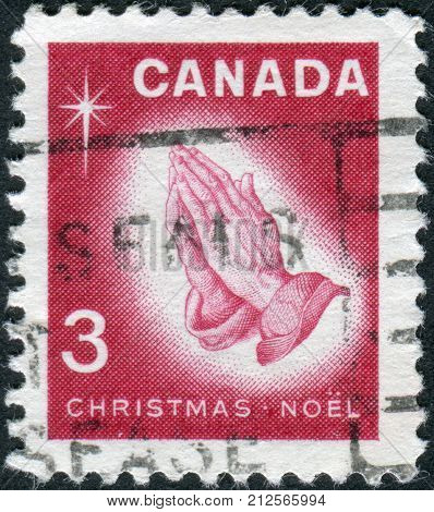 CANADA - CIRCA 1966: Postage stamp printed in Canada Christmas issue shows Praying Hands by Albrecht Duerer circa 1966