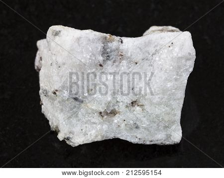 Rough Carbonatite Stone On Dark Background