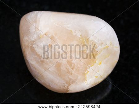 Polished Stilbite Gemstone On Dark Background