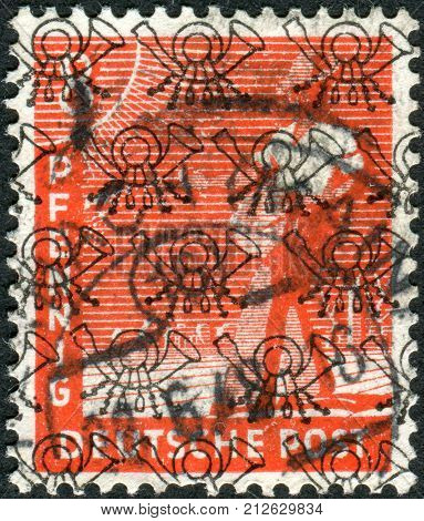 GERMANY - CIRCA 1947: Postage stamp printed in Germany (overpint Type B: US and British occupation zone) shows the sower circa 1947
