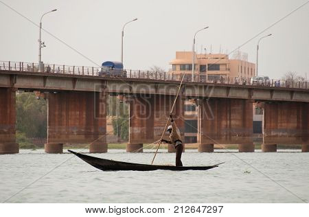 BAMAKO, MALI - CIRCA FEBRUARY 2012: Bozo fisherman on the river Niger in Bamako.