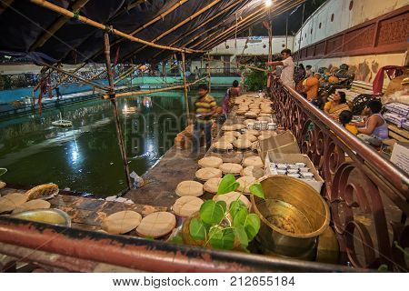 KOLKATA WEST BENGAL INDIA - 13 MAY 2017: Foods being prepared for devotees after worshipping Lord Hanuman known as Hanuman ji in India. The holy food is called 'Prasad