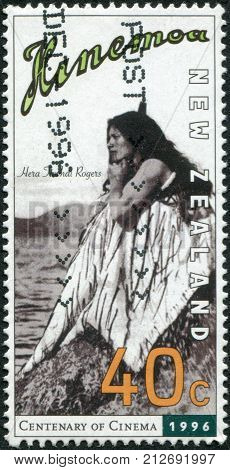 NEW ZEALAND - CIRCA 1996: A stamp printed in New Zealand is dedicated to the 100th anniversary of the movie shows promotional screen shot 