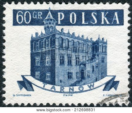 POLAND - CIRCA 1958: Postage stamp printed in Poland shows the town hall in Tarnow circa 1958