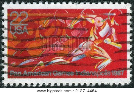 USA - CIRCA 1987: A postage stamp printed in the USA dedicated to the Pan American Games Indianapolis shows Runner in Full Stride circa 1987