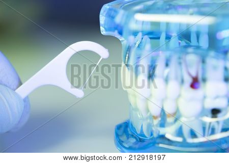 Dental Floss Cleaning Teeth