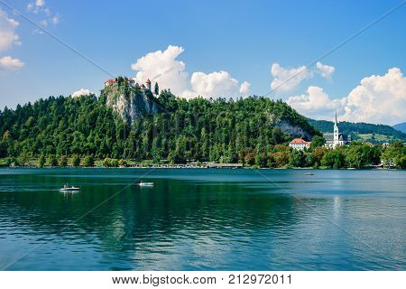 Colorful summer scene on the Bled lake with medieval castle Blejski grad. Slovenia, Europe.
