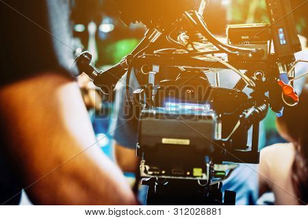 Behind The Scene. Cameraman Shooting Film Scene With Camera