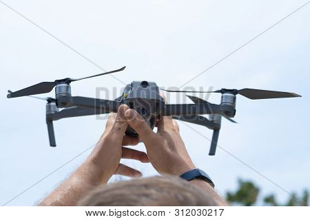 Male Hand Launches Drone For Flight, With Which You Can Take Photos And Video Filming