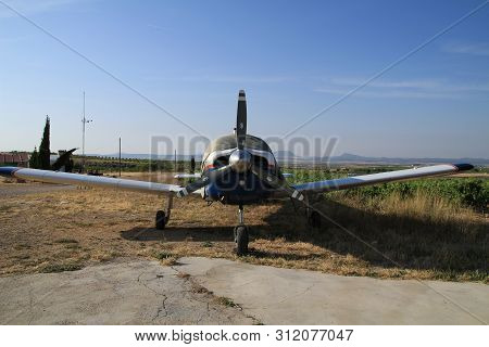 Ontur, Murcia, Spain- June 22, 2019: White And Blue Aircraft Parked In Aerodrome In A Sunny Day Of S