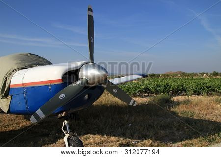 Ontur, Murcia, Spain- June 22, 2019: White And Blue Aircraft Parked In Aerodrome In A Sunny Day Of S