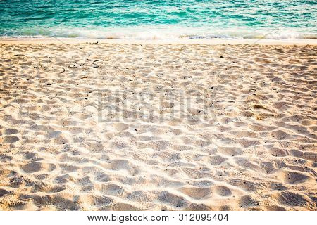fine sand and clear blue water - beach background