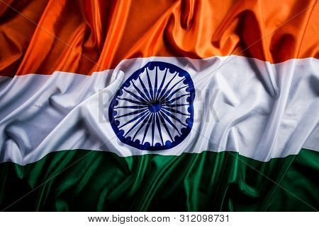Top View Of National Flag Of India On Wooden Background. Indian Independence Day.