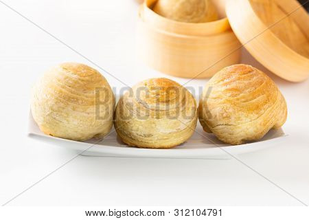 Oriental Food Concept Homemade Organic Huaiyang Spiral Chinese Flaky  Pastry Moon Cake On White Back