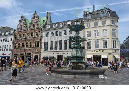 People Walking In The Old Center Of Copenhagen On Denmark