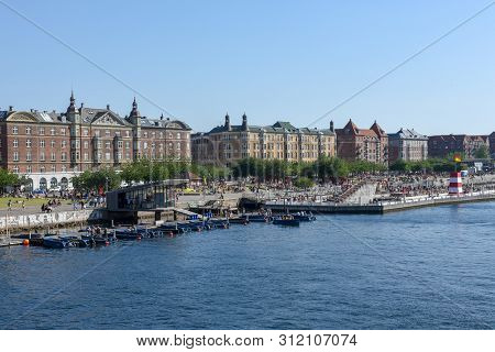 Copenhagen Denmark - 25 June 2019: People Sunbathing In The Center Of Copenhagen On Denmark