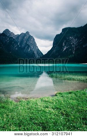 Dobbiaco Lake In The Dolomites Alps, Summer Landscape, Bolzano, Italy.