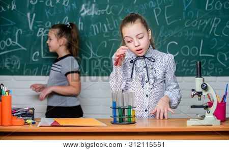 Biology Lesson. Back To School. Little Scientist Work With Microscope. Little Girls In School Lab. B