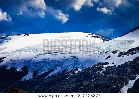 Tourism Vacation And Travel. Fantastic View On Mountains Landscape With Glacier From Dalsnibba Viewp