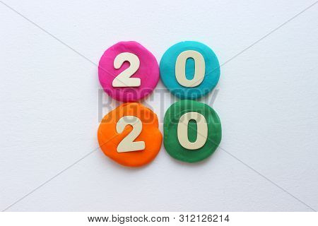 2020 Background .the Concept Of The New 2020. New Year With Colorful Numbers 2020 On White Backgroun